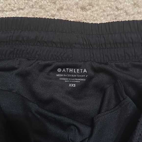 Athleta mesh racer run short 4”; zipper pocket and interior key pocket - Picture 2 of 4